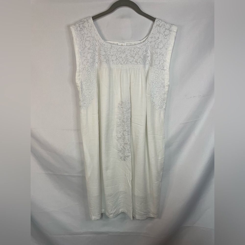 J Marie white embroidered White Sleeveless Lace Dress; lined with pockets.